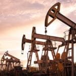 Oil and Gas Stocks Slip Amid Trade Tensions and Falling Crude Prices